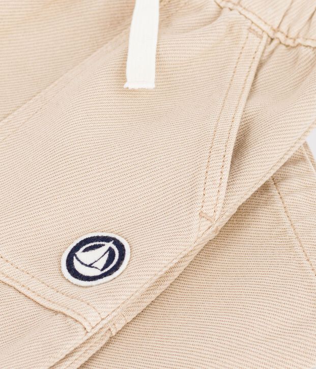 Baby-Hose aus einfarbiger Baumwolle mit Aufn&auml;her im Cargo-Stil beige