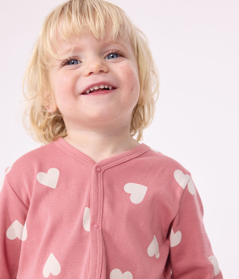 Gemusterter Strampler ohne F&uuml;&szlig;chen aus Baumwolle rosa/weiss