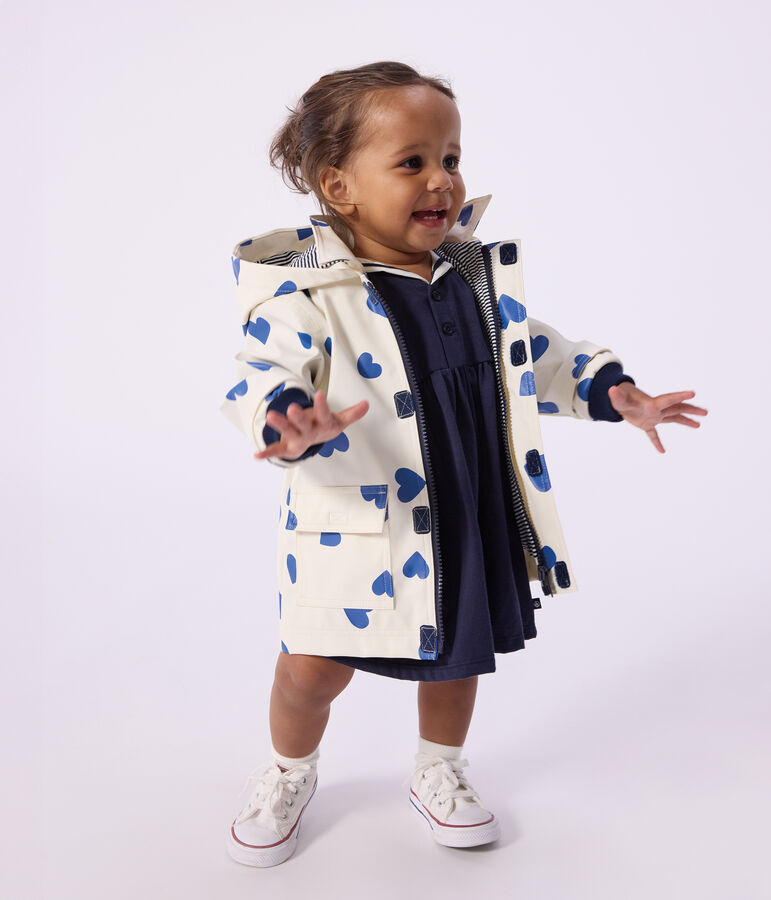 Ikonische Baby-Regenjacke naturfarben/blau
