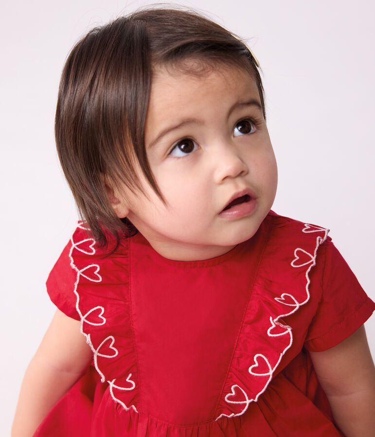 Kurz&auml;rmeliges Babykleid aus einfarbiger Baumwolle und dazu passender Bloomer rot