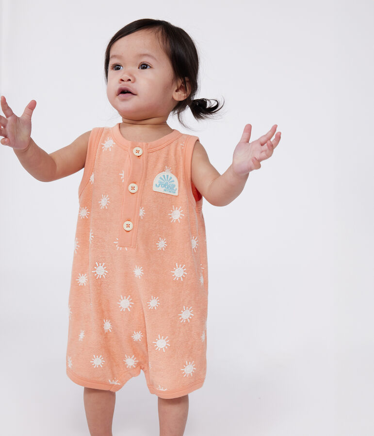 &Auml;rmelloser Baby-Kurzoverall aus Baumwoll-Frottee mit Sonnenmuster orange/weiss