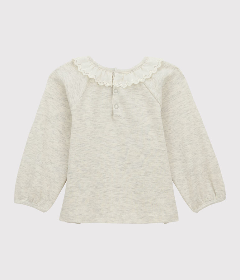 Baby-Bluse aus Baumwolle. beige