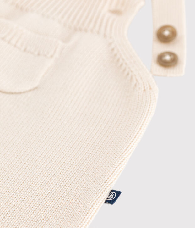 Baby-Latzhose aus Woll- und Baumwollstrick naturfarben