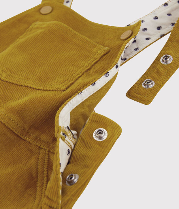 Baby-Latzhose aus Velours. gelb