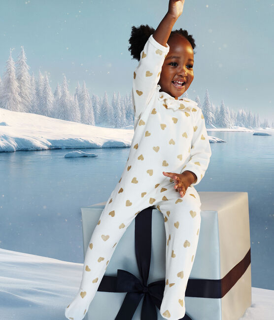 Baby-Pyjama aus Samt mit Öffnung auf der Rückseite und bedruckt mit Paillettenherzen MILK/ DORE