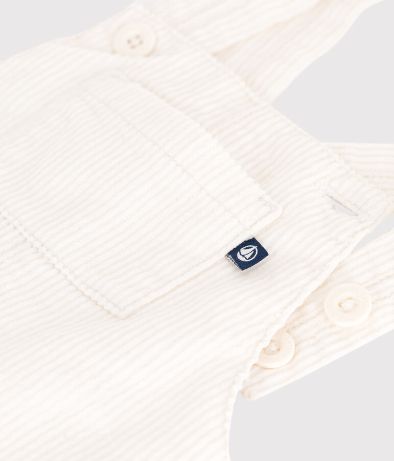 Baby-Latzhose aus einfarbigem Fein-Cord naturfarben