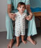 Baby-Kurzoverall aus Baumwolle mit Dinos weiss MARSHMALLOW/weiss MULTICO
