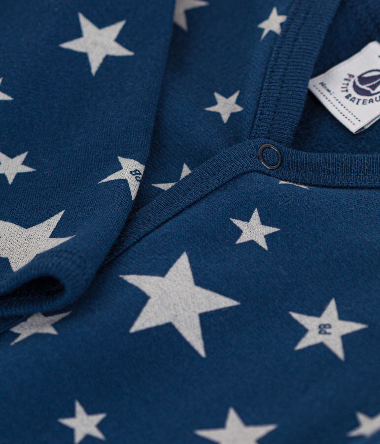 Strampler aus Molton mit phosphoreszierenden Sternen blau/weiss