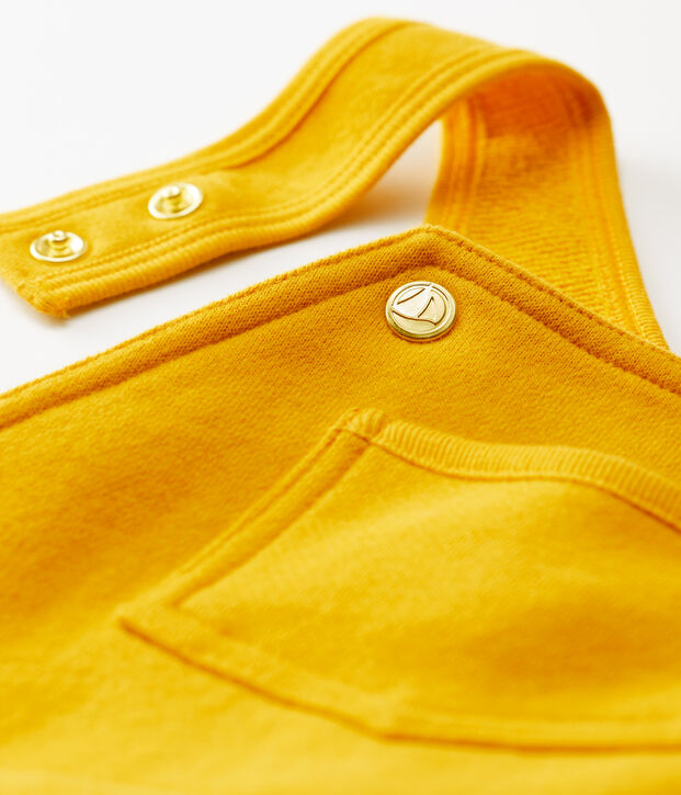 Baby-Latzhose aus Molton. gelb