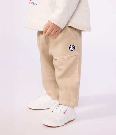 Baby-Hose aus einfarbiger Baumwolle mit Aufn&auml;her im Cargo-Stil