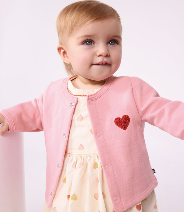 Baby-Cardigan aus einfarbiger Baumwolle mit Herzaufn&auml;her rosa