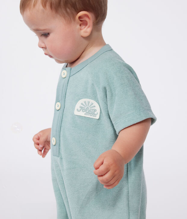 Baby-Kurzoverall aus einfarbigem Baumwoll-Frottee mit Aufn&auml;her gr&uuml;n